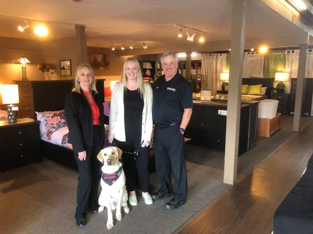 John, Lynn, their daughter and the family dog inside John’s Bedrooms
